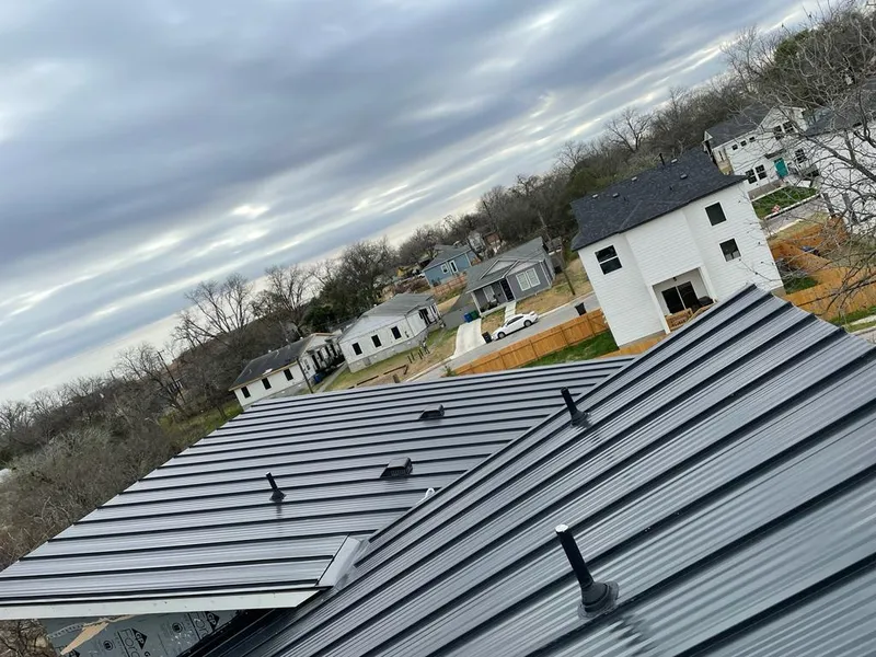 Standing seam metal roof panels with vents for Skylight Repair in Taylor